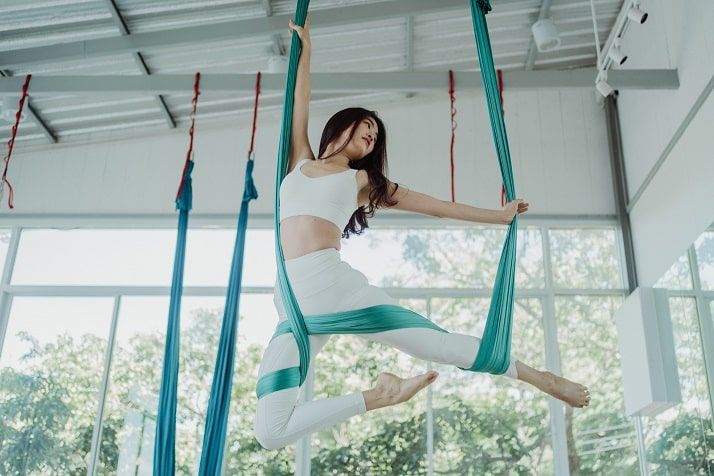 Aerial Yoga: What Is It & How Can It Help Relieve Pain? Featured on CBS